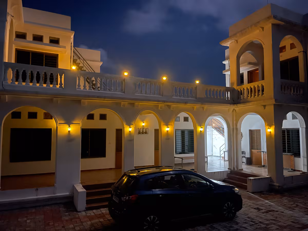 Revan Hills courtyard and arches at night